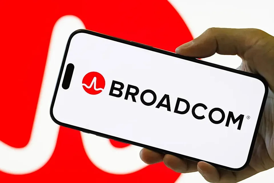 Broadcom logo displayed on a smartphone, highlighting AVGO stock, Sam Altman, AI token usage, AI infrastructure, and Broadcom AI chips.