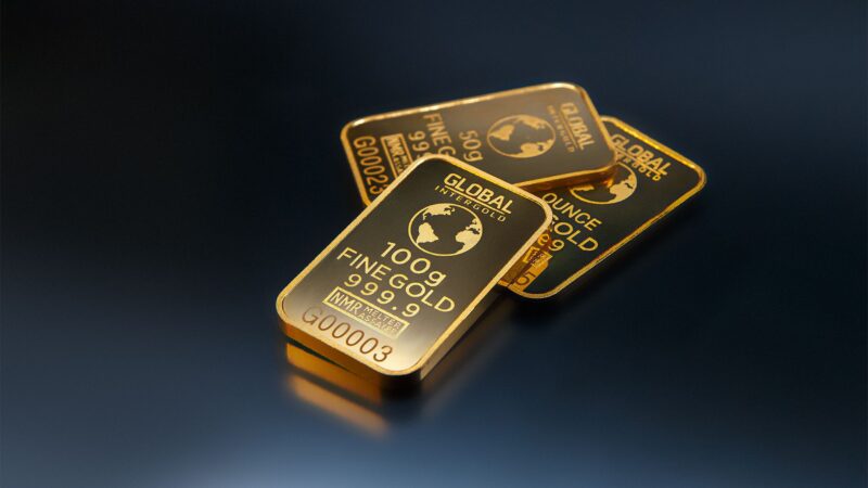 Gold bars representing Gold price, the Gold $5000 target, Gold price prediction, Gold investment, and Gold demand in the global market.