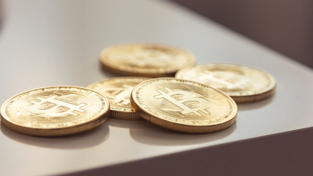 Bitcoin coins representing Bitcoin ETF Bitcoin golden cross Bitcoin price Bitcoin demand and US spot ETFs