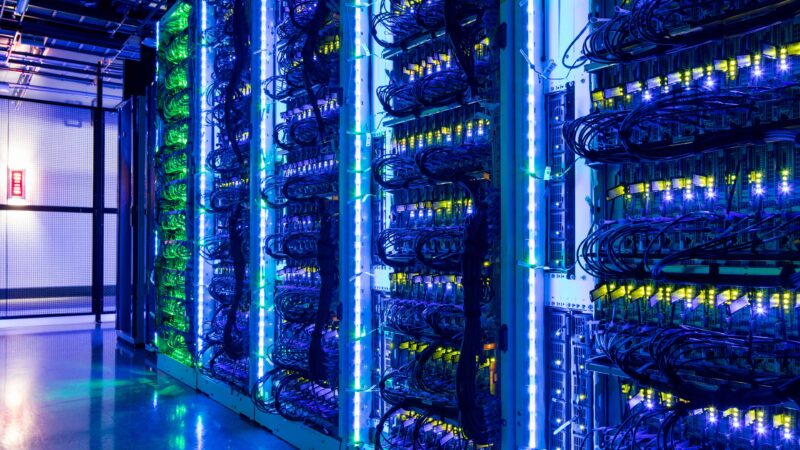 AI data centers with server racks and network cables representing AI financing and AI investments amid Bank of America market overheating concerns