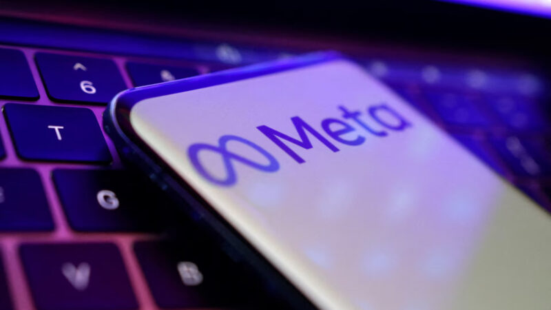 meta logo on a phone