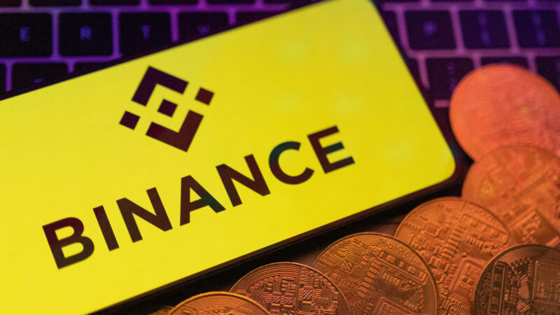 binance logo on a phone