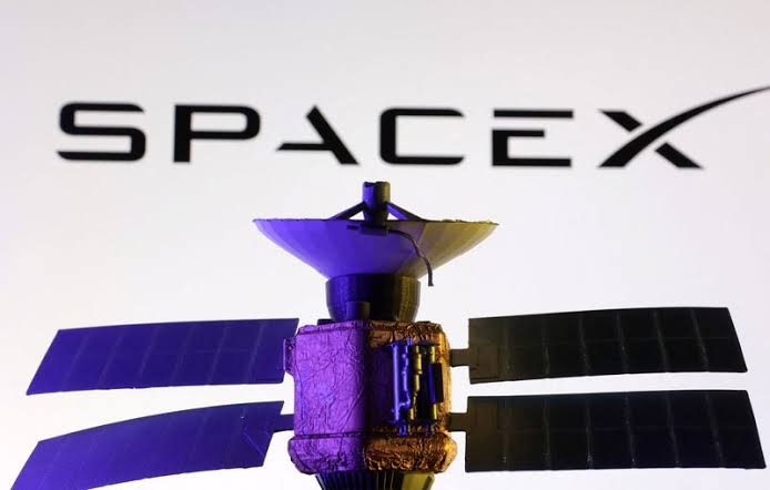 spacex logo with a satelite