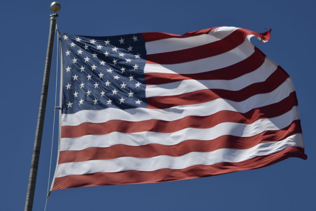 US Flag representing US Job Openings US Dollar Dollar Strength US Labor Market and Fed Rate Hike outlook